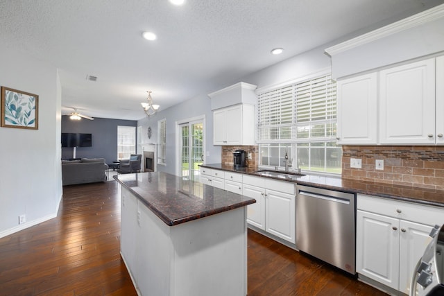 804 Wonder Way, Grapevine, TX 76051 - kitchen with dishwasher, a kitchen island, recessed lighting, open floor plan, and decorative backsplash