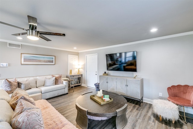 205 N Weatherred Dr, Richardson, TX 75080 - living area featuring wood finished floors, ceiling fan, crown molding, and recessed lighting