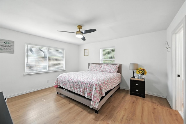 336 Davis Dr, Desoto, TX 75115 - bedroom with light wood-style floors and a ceiling fan