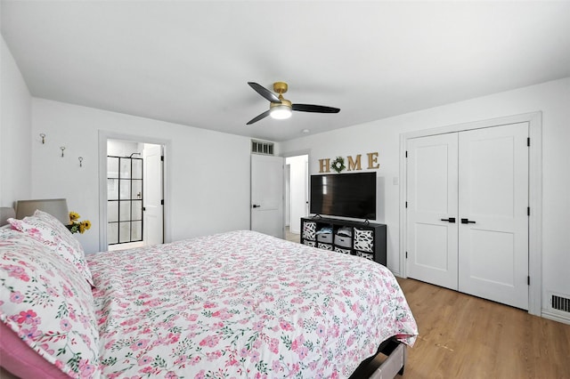 336 Davis Dr, Desoto, TX 75115 - bedroom featuring light wood-style floors, ceiling fan, and a closet
