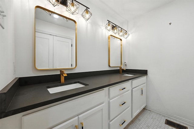 336 Davis Dr, Desoto, TX 75115 - full bathroom with double vanity and tile patterned flooring
