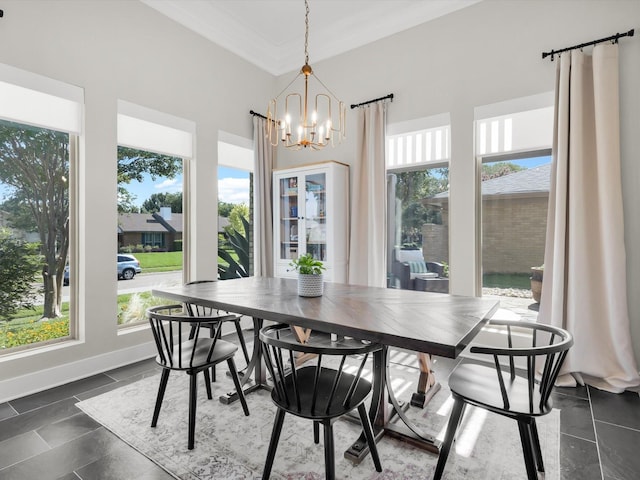 3813 Fall Wheat Dr, Plano, TX 75075 - dining area with healthy amount of natural light, a chandelier, and ornamental molding