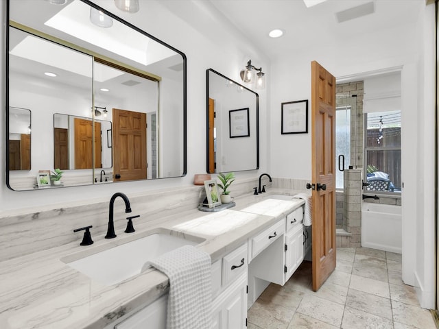 3813 Fall Wheat Dr, Plano, TX 75075 - bathroom with double vanity, recessed lighting, and a shower with door