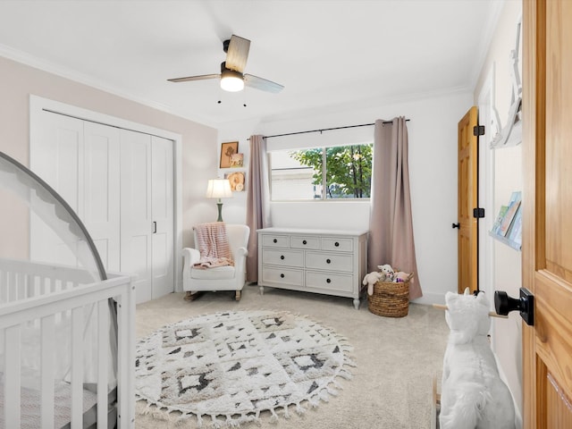 3813 Fall Wheat Dr, Plano, TX 75075 - bedroom with light colored carpet, a closet, crown molding, a ceiling fan, and a nursery area