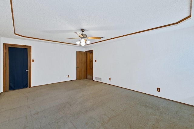 7254 Hialeah Cir W, North Richland Hills, TX 76182 - carpeted empty room featuring a ceiling fan and a textured ceiling