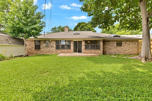 7254 Hialeah Cir W, North Richland Hills, TX 76182 - back of house featuring a chimney, brick siding, and a patio area