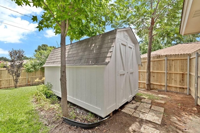 7254 Hialeah Cir W, North Richland Hills, TX 76182 - view of shed with a fenced backyard
