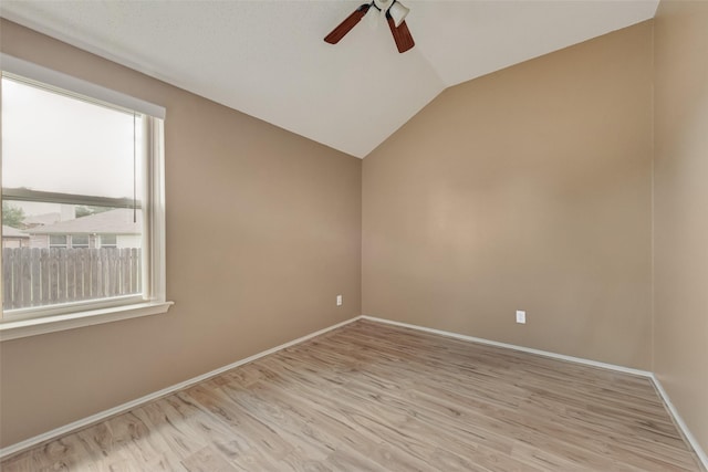 122 Ashbrook Trl, Forney, TX 75126 - spare room featuring a ceiling fan, light wood-type flooring, and vaulted ceiling