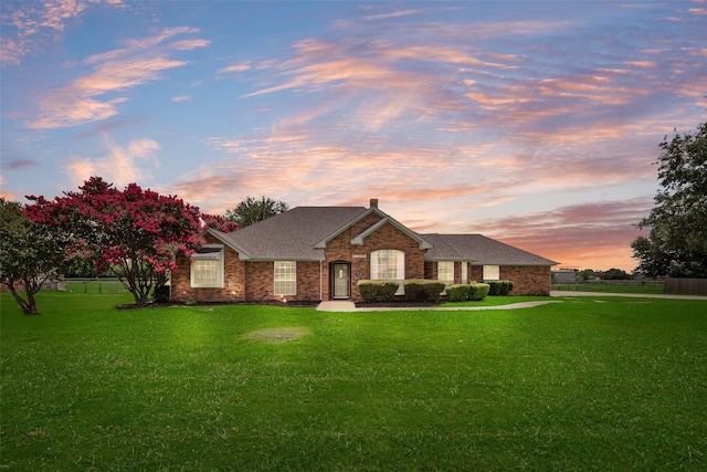 11275 Old Military Trl, Forney, TX 75126 - view of front of property featuring a yard, roof with shingles, and brick siding