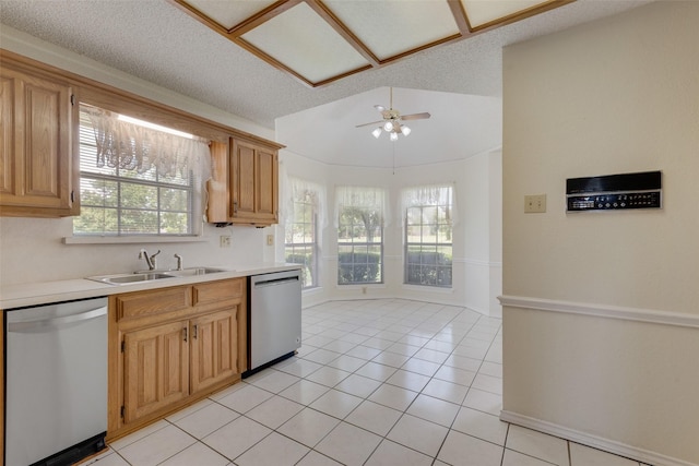 11275 Old Military Trl, Forney, TX 75126 - kitchen featuring stainless steel dishwasher, light countertops, ceiling fan, light tile patterned floors, and vaulted ceiling