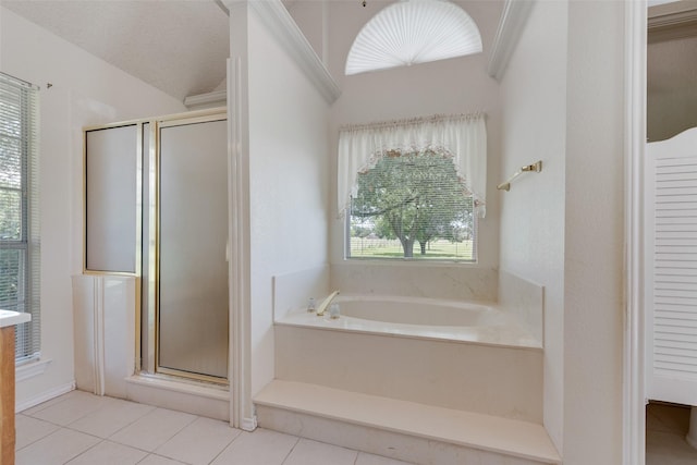 11275 Old Military Trl, Forney, TX 75126 - full bathroom featuring a bath, a shower stall, tile patterned floors, a closet, and vaulted ceiling