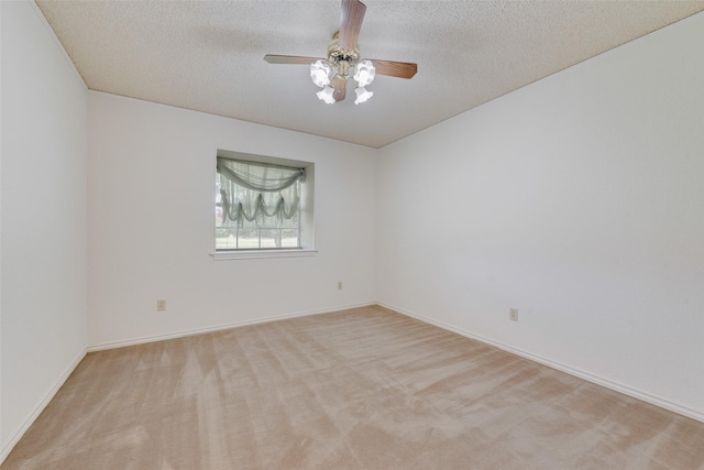11275 Old Military Trl, Forney, TX 75126 - unfurnished room with carpet, a ceiling fan, and a textured ceiling