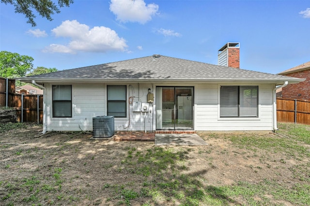 1450 Hampton Rd, Grapevine, TX 76051 - rear view of property with a chimney and roof with shingles