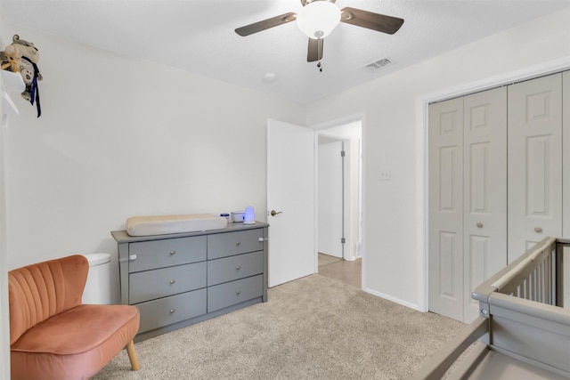2212 Hurstview Dr, Hurst, TX 76054 - bedroom featuring carpet flooring, a closet, and ceiling fan