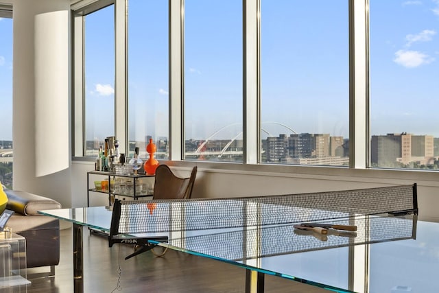 2200 Victory Ave Unit 1105, Dallas, TX 75219 - interior space featuring a city view, wood finished floors, and a ceiling fan