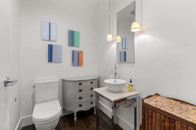 2200 Victory Ave Unit 1105, Dallas, TX 75219 - bathroom featuring wood finished floors and vanity