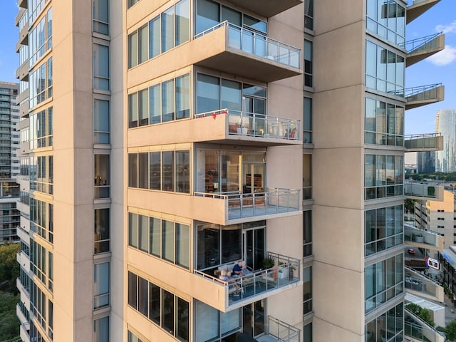 2200 Victory Ave Unit 1105, Dallas, TX 75219 - view of apartment building / complex featuring a view of city