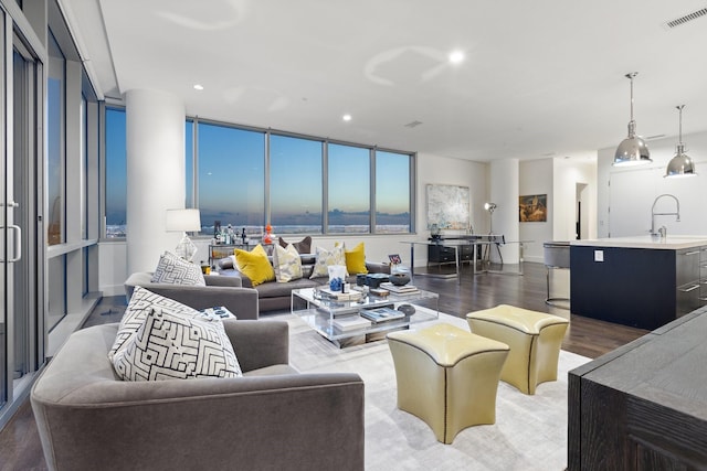 2200 Victory Ave Unit 1105, Dallas, TX 75219 - living room with wood finished floors and recessed lighting