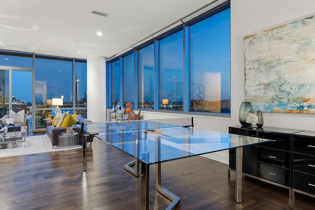 2200 Victory Ave Unit 1105, Dallas, TX 75219 - home office with expansive windows, wood finished floors, and recessed lighting