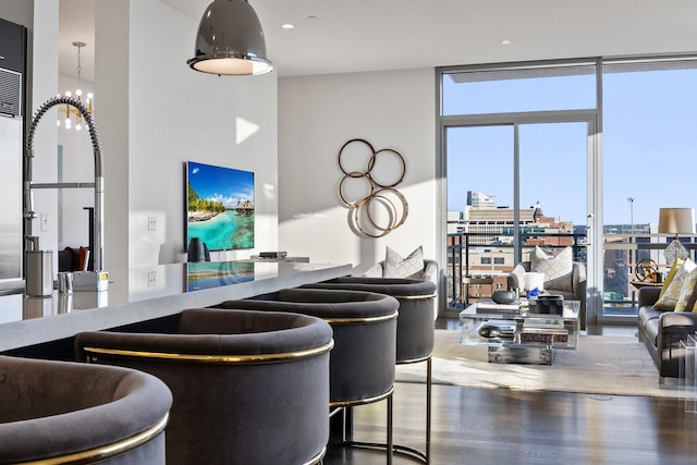 2200 Victory Ave Unit 1105, Dallas, TX 75219 - bar area featuring expansive windows and wood finished floors