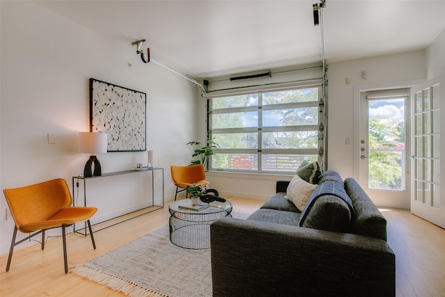 1111 S Akard St Unit 310, Dallas, TX 75215 - living area featuring wood finished floors and baseboards