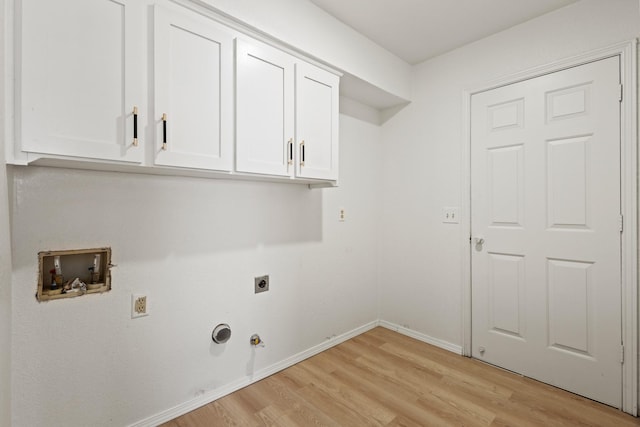 3948 Camino Dr, Plano, TX 75074 - washroom with hookup for a washing machine, hookup for an electric dryer, cabinet space, light wood-style flooring, and hookup for a gas dryer