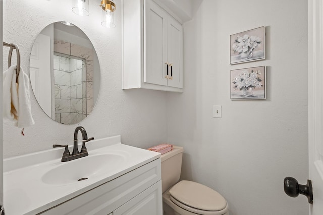 3948 Camino Dr, Plano, TX 75074 - bathroom featuring vanity and toilet