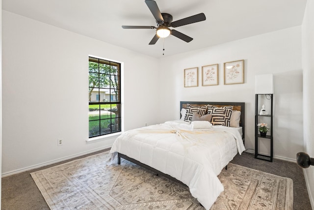 3948 Camino Dr, Plano, TX 75074 - carpeted bedroom with baseboards and a ceiling fan