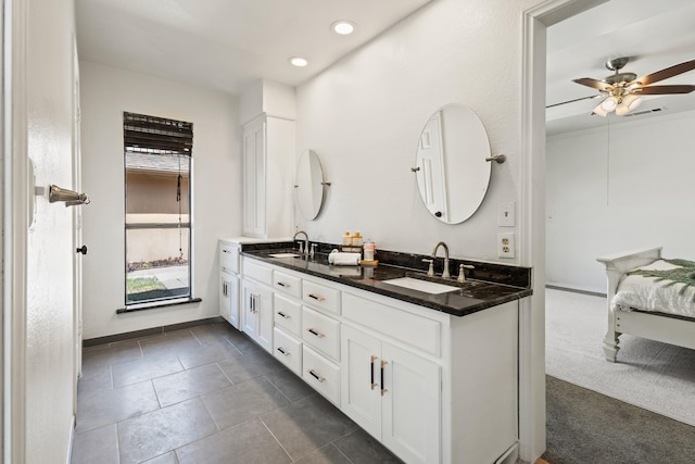 3948 Camino Dr, Plano, TX 75074 - bathroom with ensuite bath, double vanity, a ceiling fan, recessed lighting, and tile patterned floors