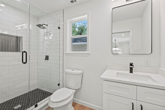 812 Sylvan Dr, Garland, TX 75040 - full bathroom with vanity, a shower stall, and wood finished floors