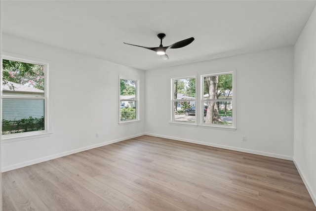812 Sylvan Dr, Garland, TX 75040 - unfurnished room featuring light wood finished floors and ceiling fan