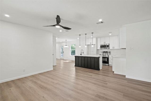 812 Sylvan Dr, Garland, TX 75040 - unfurnished living room with recessed lighting, a ceiling fan, and light wood-style floors