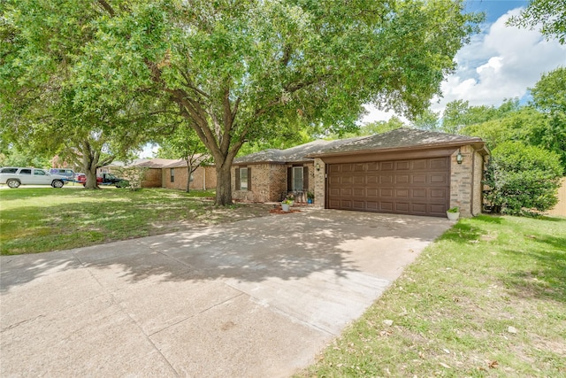 6516 Cliffside Dr, Edgecliff Village, TX 76134 - view of front of house featuring a garage, driveway, brick siding, and a front yard