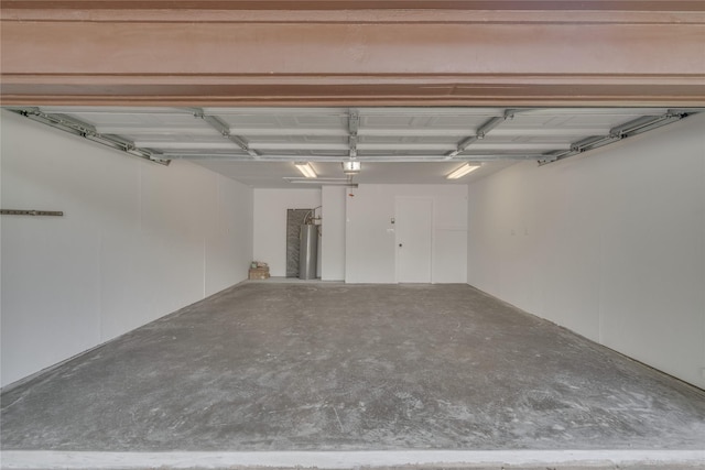 6516 Cliffside Dr, Edgecliff Village, TX 76134 - garage with water heater and a garage door opener