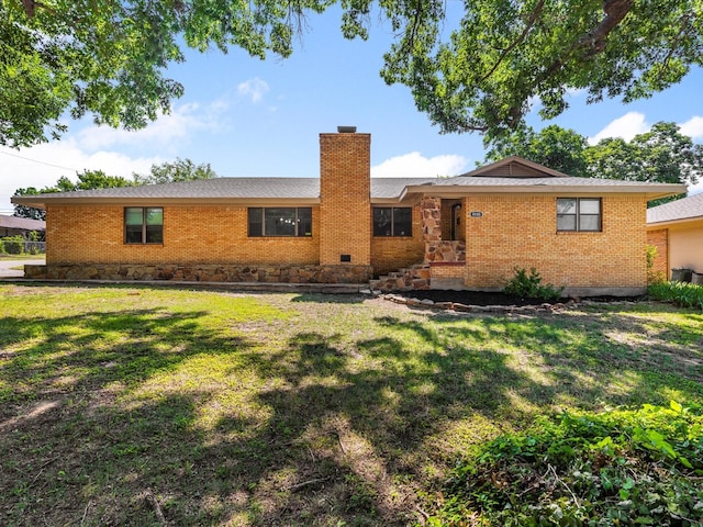 4108 Grand Lake Dr, Lake Worth, TX 76135 - ranch-style home with a chimney, a front yard, and brick siding