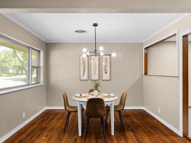 4108 Grand Lake Dr, Lake Worth, TX 76135 - dining room with a chandelier, dark wood-style flooring, and crown molding