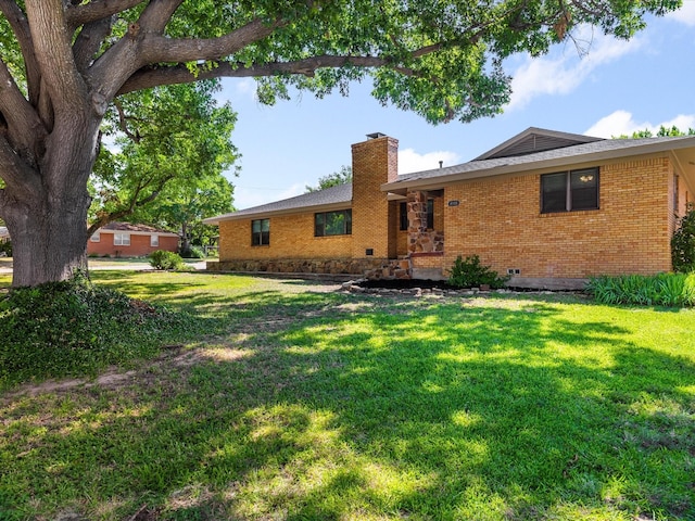 4108 Grand Lake Dr, Lake Worth, TX 76135 - back of property featuring a chimney, a yard, crawl space, and brick siding