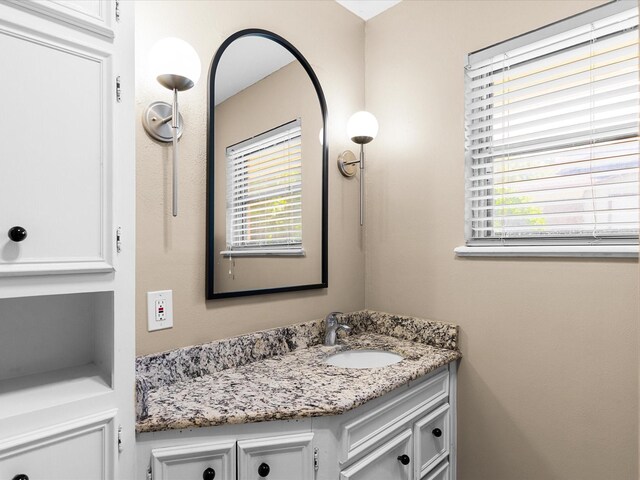 4108 Grand Lake Dr, Lake Worth, TX 76135 - bathroom with healthy amount of natural light and vanity