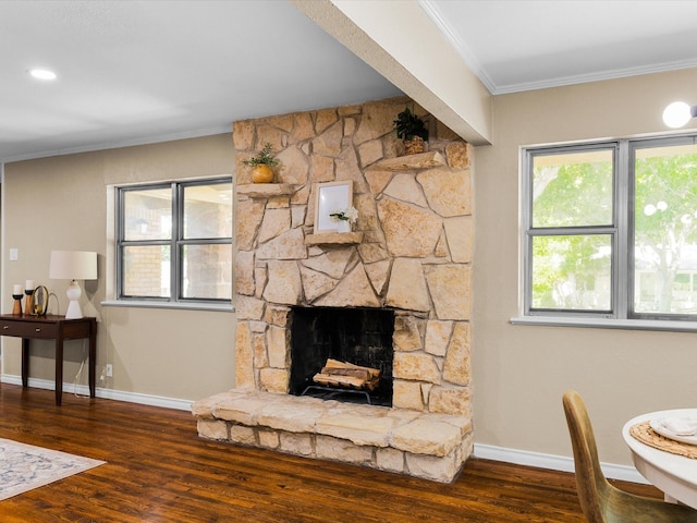 4108 Grand Lake Dr, Lake Worth, TX 76135 - living area with wood finished floors, crown molding, and a stone fireplace