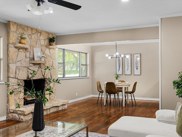 4108 Grand Lake Dr, Lake Worth, TX 76135 - living room featuring ceiling fan, ornamental molding, wood finished floors, a fireplace, and a chandelier