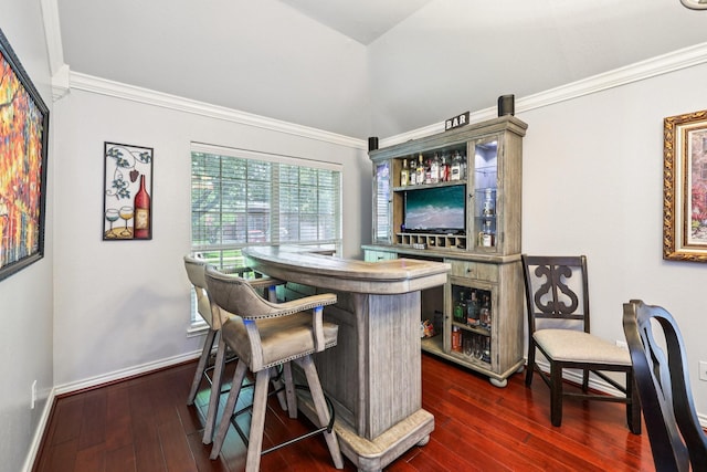 8700 Blacktail Trl, Mckinney, TX 75070 - indoor dry bar featuring dark wood-style floors and crown molding