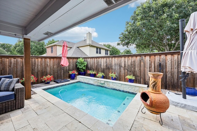 8700 Blacktail Trl, Mckinney, TX 75070 - view of swimming pool featuring a patio area and a fenced backyard
