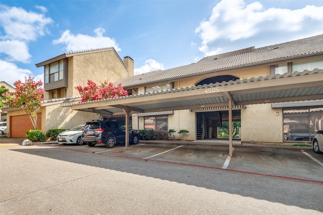 4505 N O Connor Rd Unit 1125, Irving, TX 75062 - view of building exterior featuring covered parking