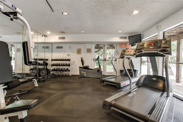 4505 N O Connor Rd Unit 1125, Irving, TX 75062 - gym with a textured ceiling and recessed lighting