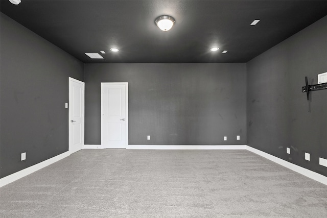 1014 Ember Crest Dr, Rockwall, TX 75087 - empty room featuring carpet floors and recessed lighting
