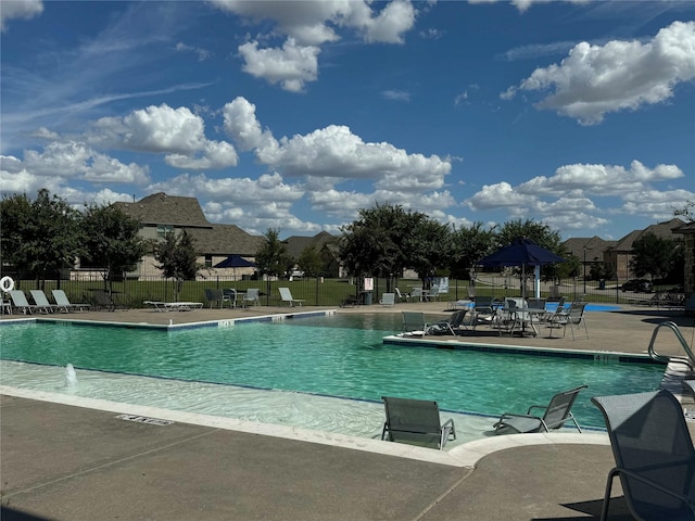 1014 Ember Crest Dr, Rockwall, TX 75087 - community pool with a patio area