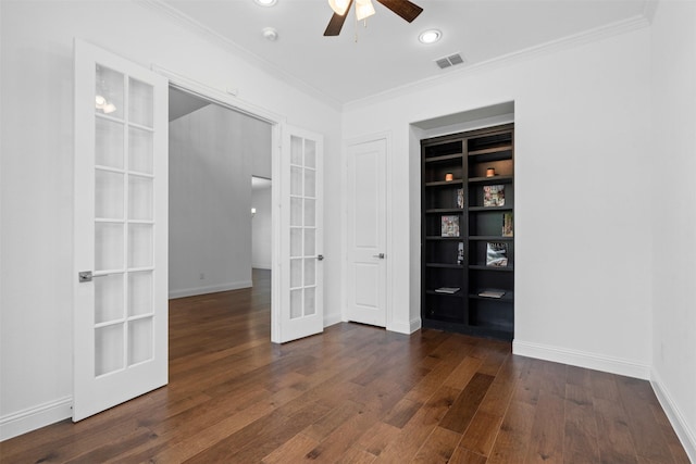 1014 Ember Crest Dr, Rockwall, TX 75087 - unfurnished room with french doors, a ceiling fan, crown molding, wood finished floors, and built in features