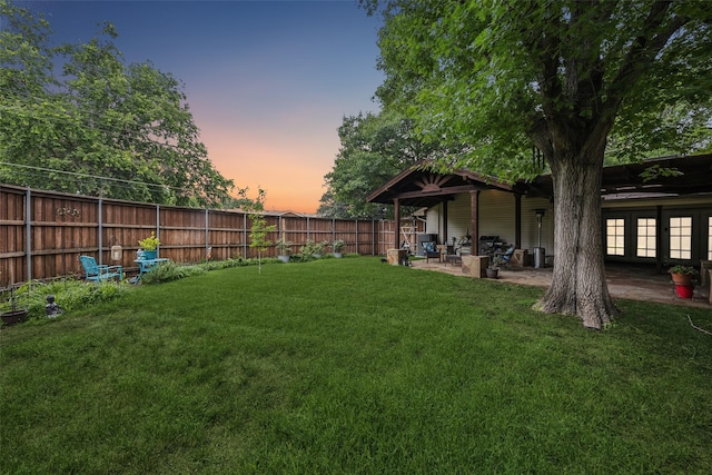 12312 Cox Ln, Dallas, TX 75244 - fenced backyard with a patio area