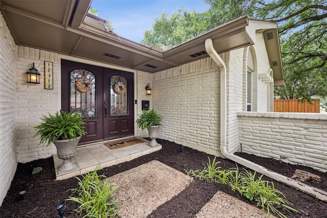 12312 Cox Ln, Dallas, TX 75244 - entrance to property with brick siding and french doors