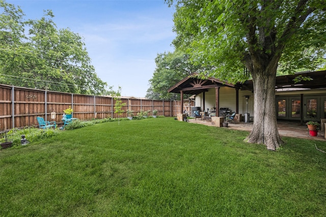 12312 Cox Ln, Dallas, TX 75244 - fenced backyard with a patio